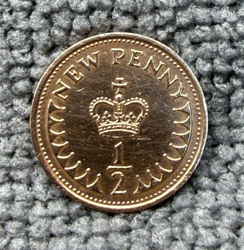 1971 half penny coin - half,